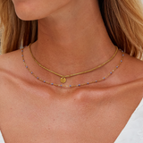 Collar de monedas de oro en capas