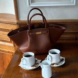 Melanie - Cuero Tote Bag