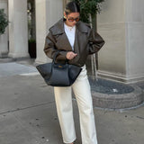 Melanie - Cuero Tote Bag
