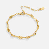 Pulsera de cadena de nudo Figaro de oro