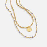 Collar de monedas de oro en capas