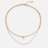 Collar de monedas de oro en capas