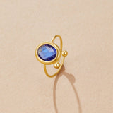 Anillo de oro con cristal de zafiro azul