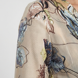 Caroline | Vestido maxi de flores con mangas tres cuartos y diseño envolvente